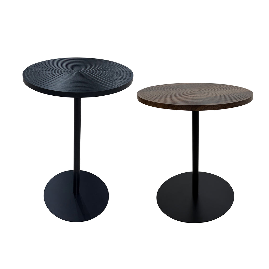Set of 2 walnut round side tables with black metal pedestal bases featuring concentric design, part of the Atelier Collection by Anthony & Home.