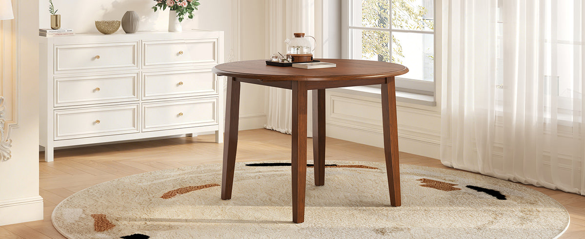 Anthony & Home Atelier Walnut Extendable Round Dining Table with 2-4 seating, showcasing a stylish wooden surface and extendable design.