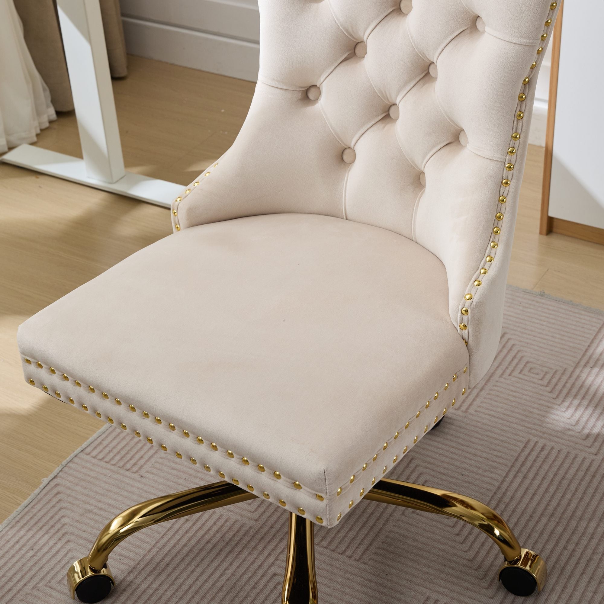 Beige A&A Velvet Tufted Office Chair by Anthony & Home with adjustable height, swivel base, and ergonomic design.