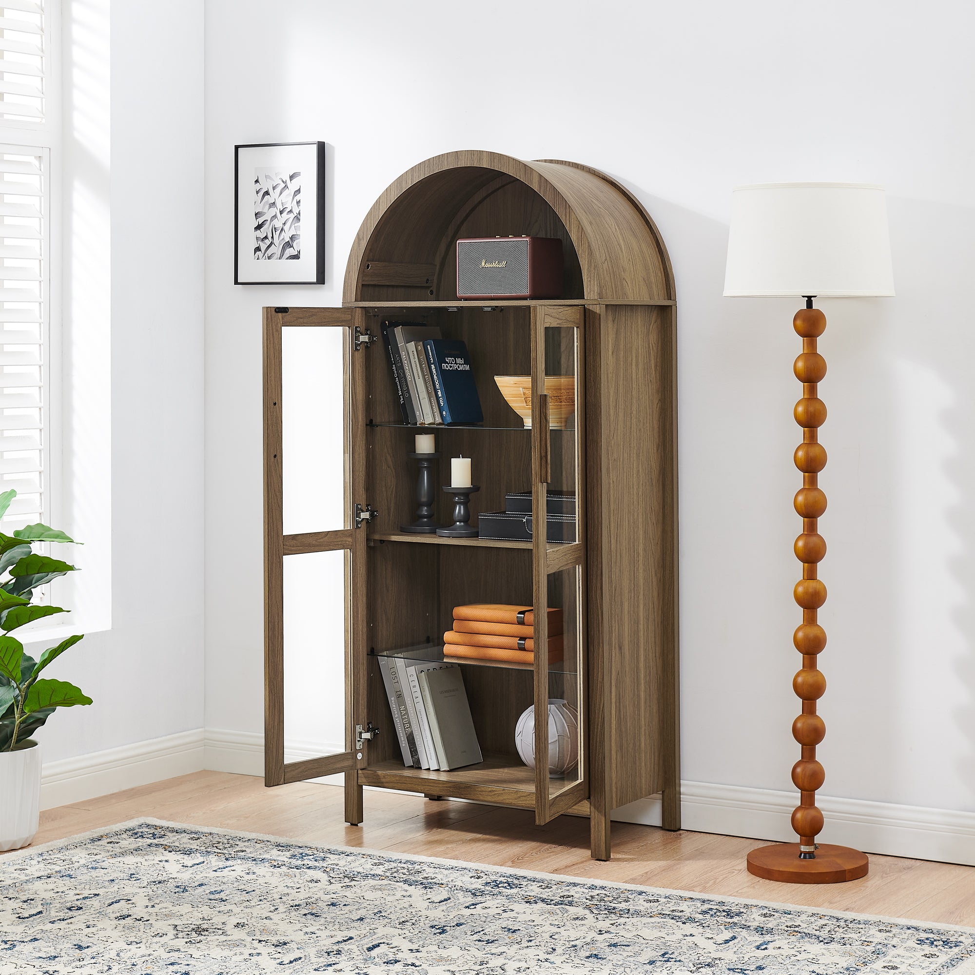 Walnut arched storage cabinet with built-in lamp by Anthony & Home, showcasing sleek wood finish and modern design.