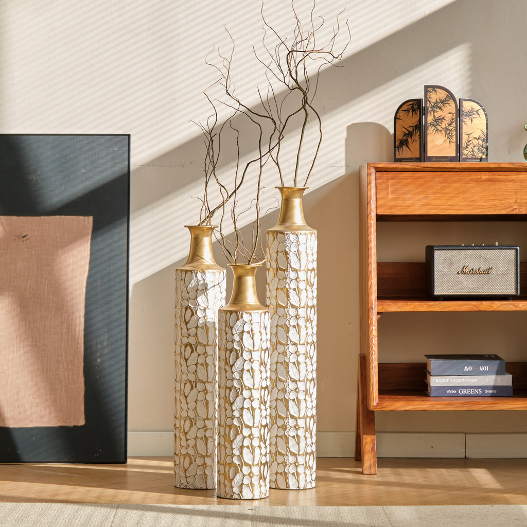 Three Heritage Collection floor vases by Anthony & Home in varying sizes with elegant, textured finishes for stylish home decor.