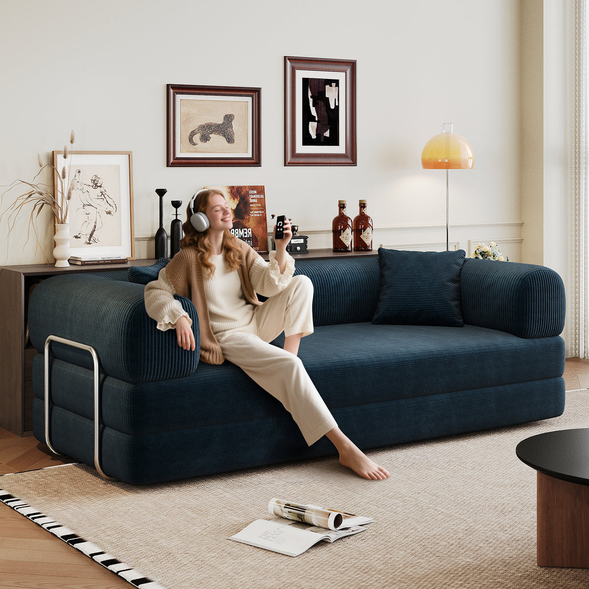 Blue Anthony & Home corduroy convertible sofa bed with plush cushions and modern design, shown in sofa and bed configurations.