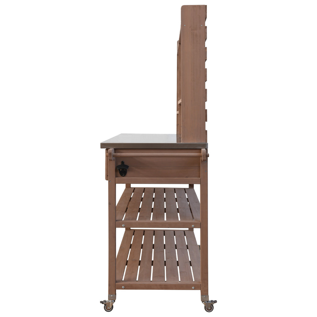Anthony & Home Signature outdoor potting bench with stainless steel top, showing a sturdy garden workspace with tools and plants.