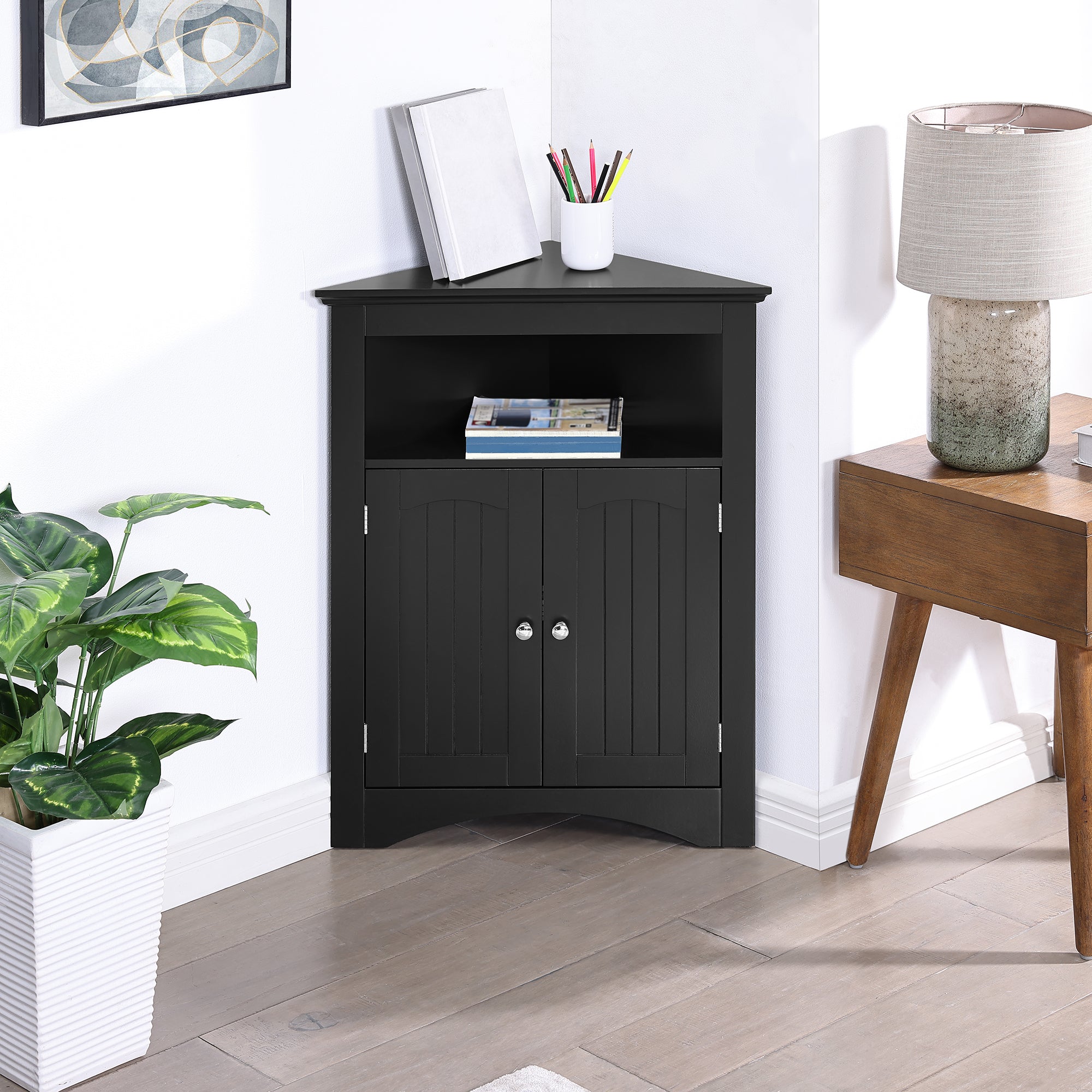 Matte black finish corner sideboard by Anthony & Home with sleek design and storage compartments.