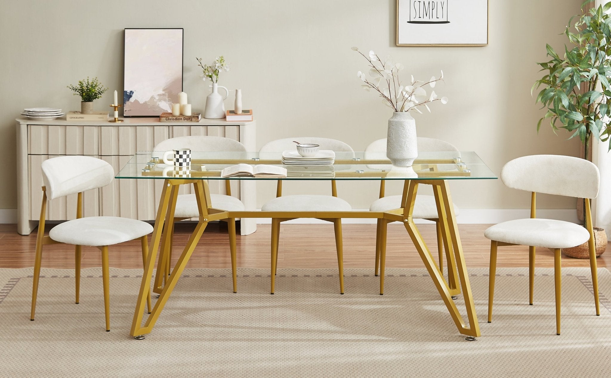 Rectangular glass dining table with gold finish from the Atelier Collection by Anthony & Home, showcasing a sleek modern design.