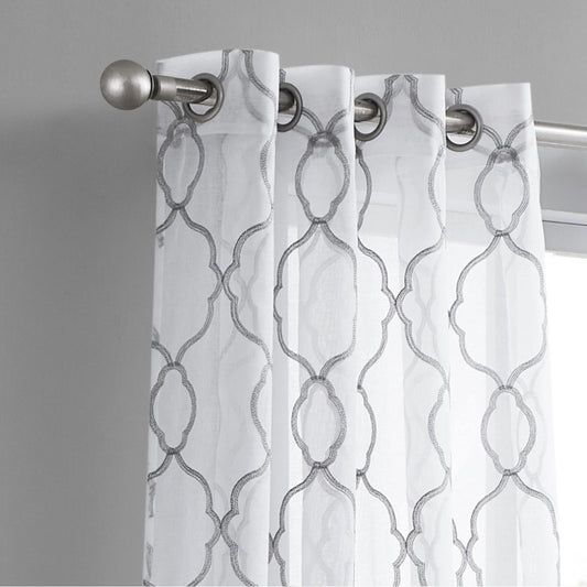 84-inch silver embroidered trellis pattern curtain panel from HomeRoots, showcasing elegant window drapes with intricate embroidery.