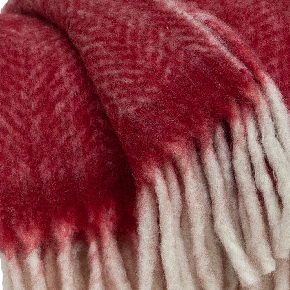 Red woven acrylic reversible throw blanket from HomeRoots, featuring solid color and textured woven pattern.