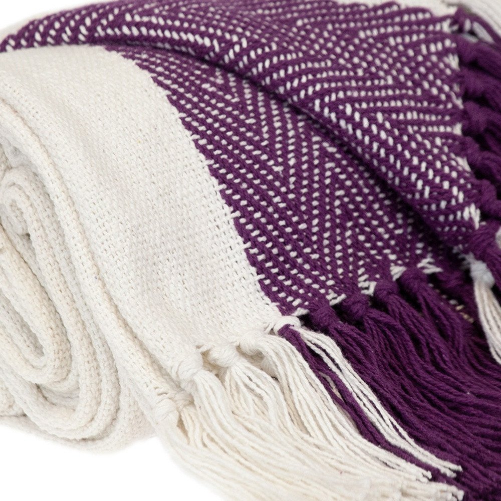 Purple woven cotton throw blanket from HomeRoots, showing its soft textured fabric and cozy design for throws and blankets.