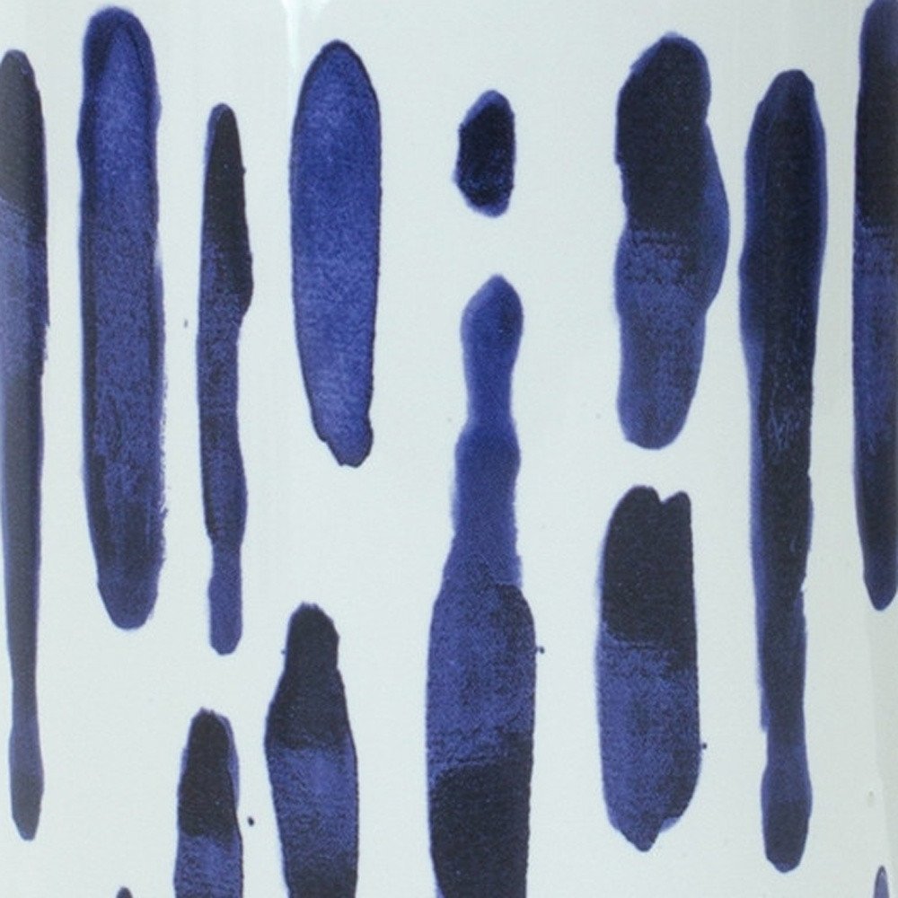 Set of two blue and white abstract ceramic cylinder vases by HomeRoots, featuring modern design and artistic patterns.