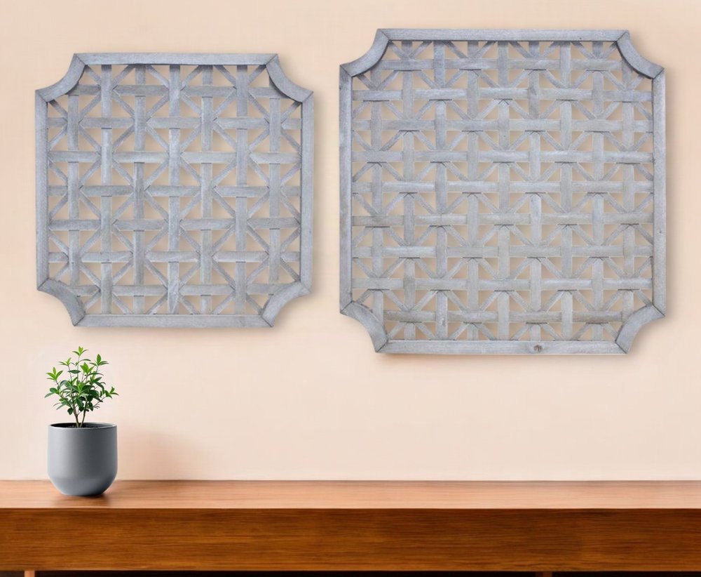 Set of two gray geometric solid wood square framed wall decor pieces featuring modern abstract designs.