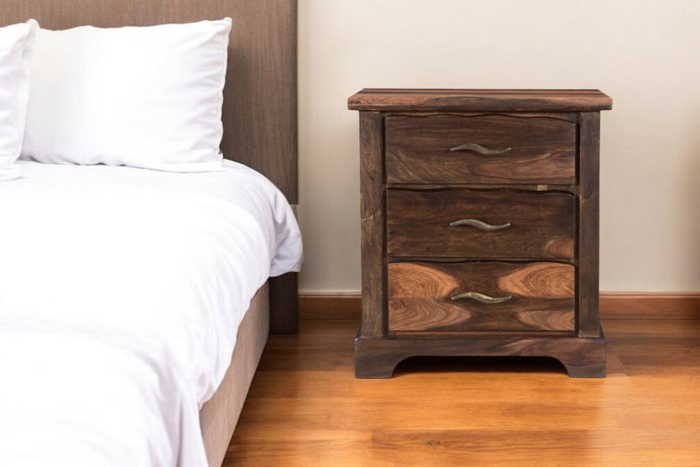 Dark brown 27-inch solid wood nightstand with three drawers, from HomeRoots, showing smooth finish and simple drawer handles.