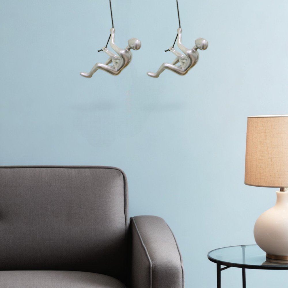 Set of Two Silver Resin Climbing Man Hanging Dimensional Sculpture