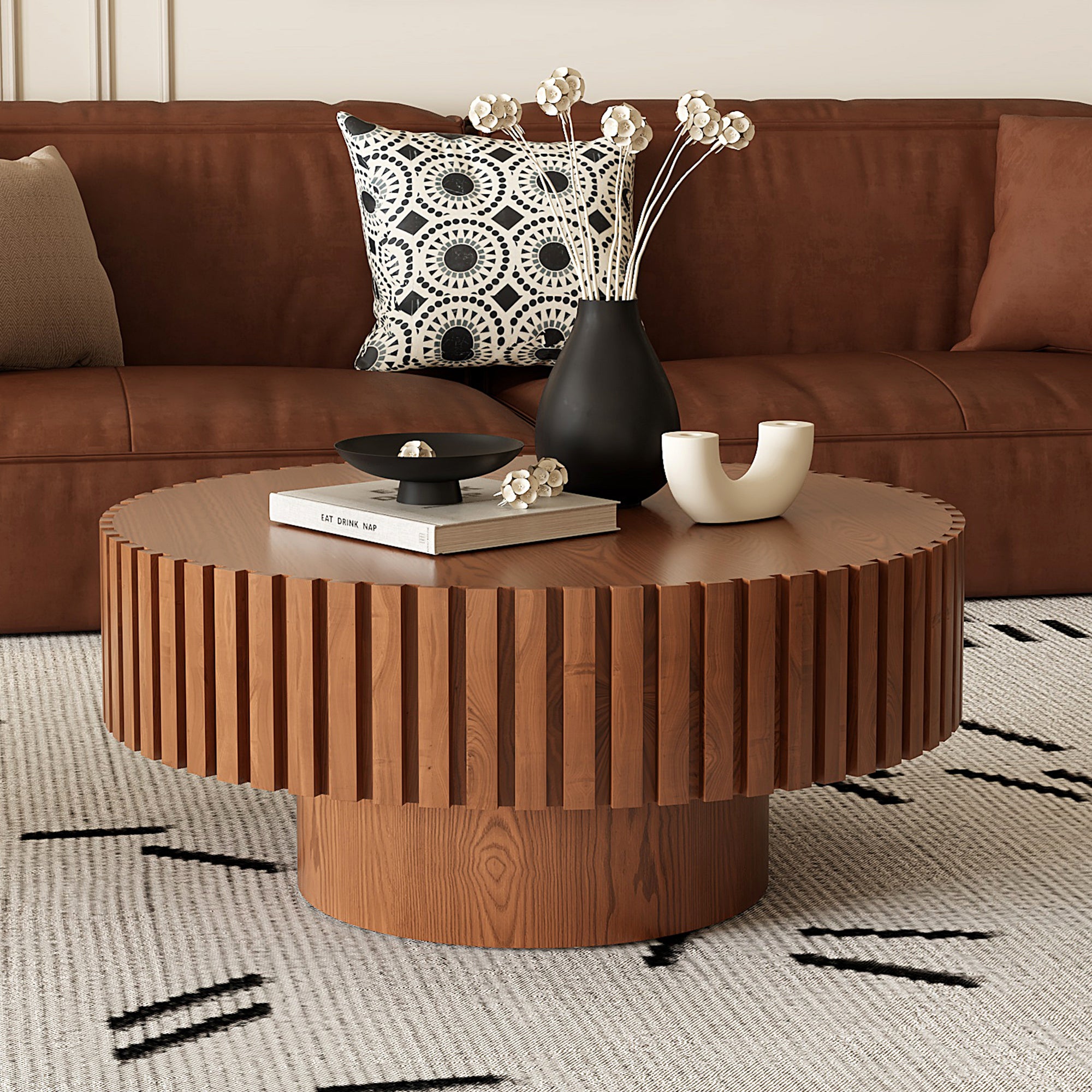 Round lacquered wood coffee table with pedestal base from Anthony & Home's Atelier collection, featuring a sleek, polished finish.