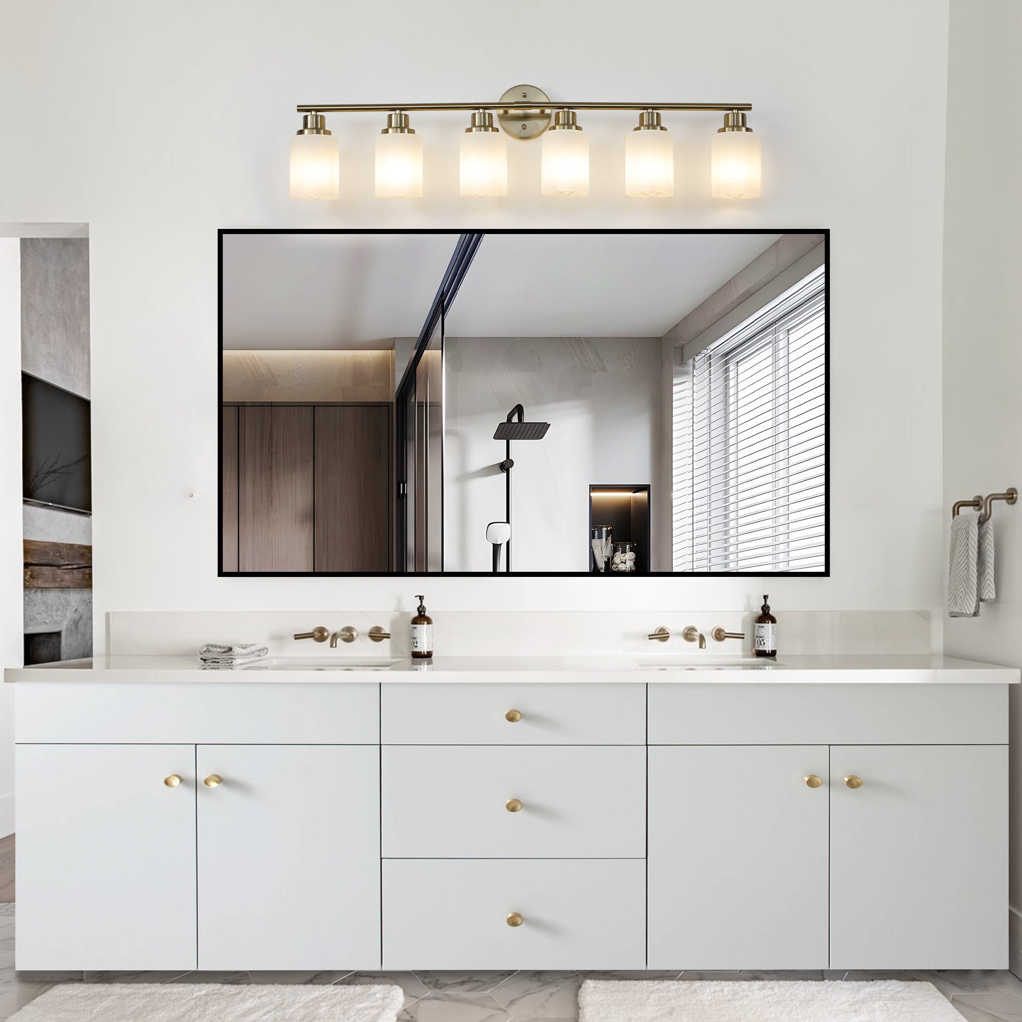 Anthony & Home Atelier Gold Finish Six-Light Vanity Wall Sconce with elegant gold accents and six candle-style lights.