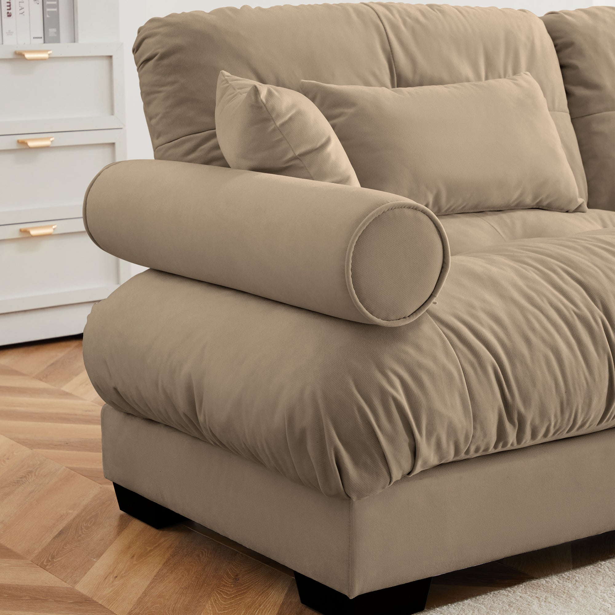 Anthony & Home Atelier Camel Velvet U-Shape Modular Sectional sofa with plush cushions and sleek design in a modern living room setting.