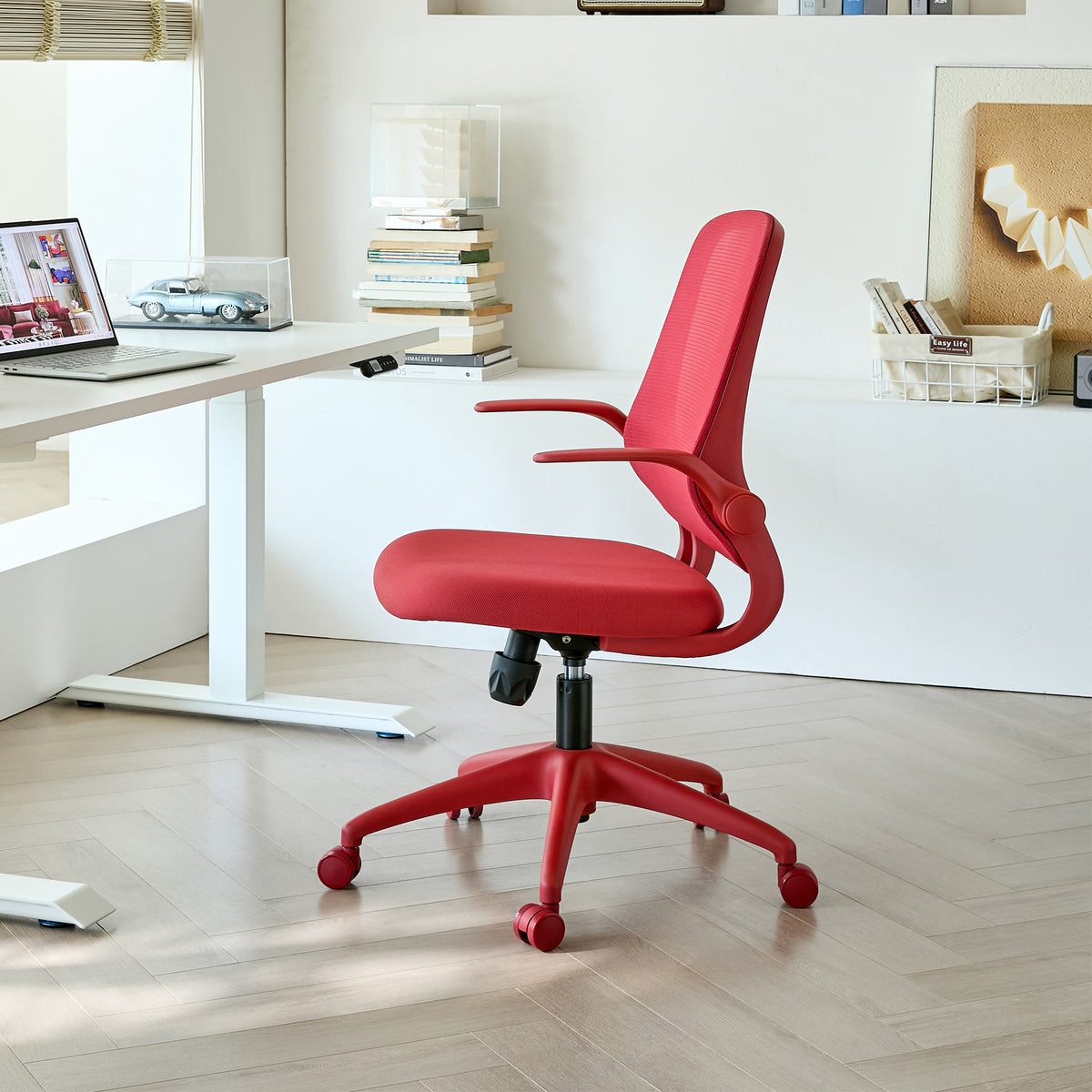 Anthony & Home ergonomic mesh office chair with red molded foam cushion from the Atelier Collection, featuring adjustable armrests and lumbar support.