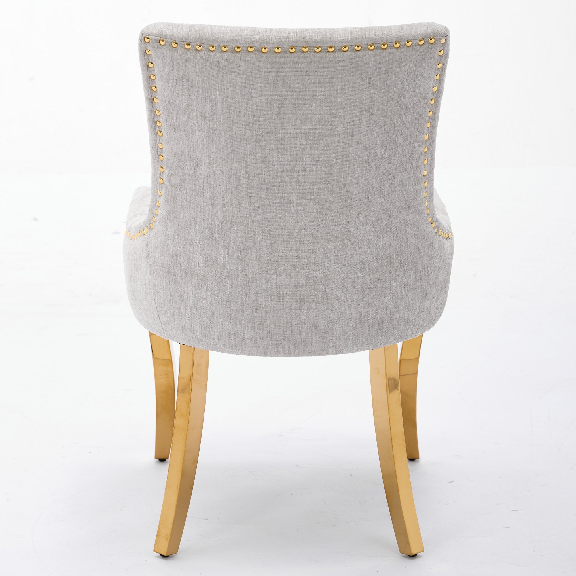 Beige chenille dining chairs with gold plated legs from Anthony & Home, stylish and comfortable for modern dining rooms.
