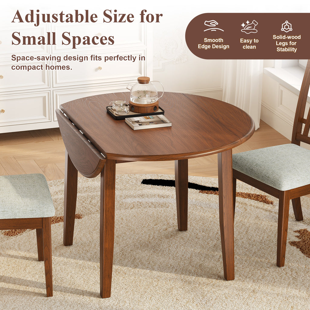 Anthony & Home Atelier Walnut Extendable Round Dining Table showing its smooth wooden surface and extendable feature with chairs around it.