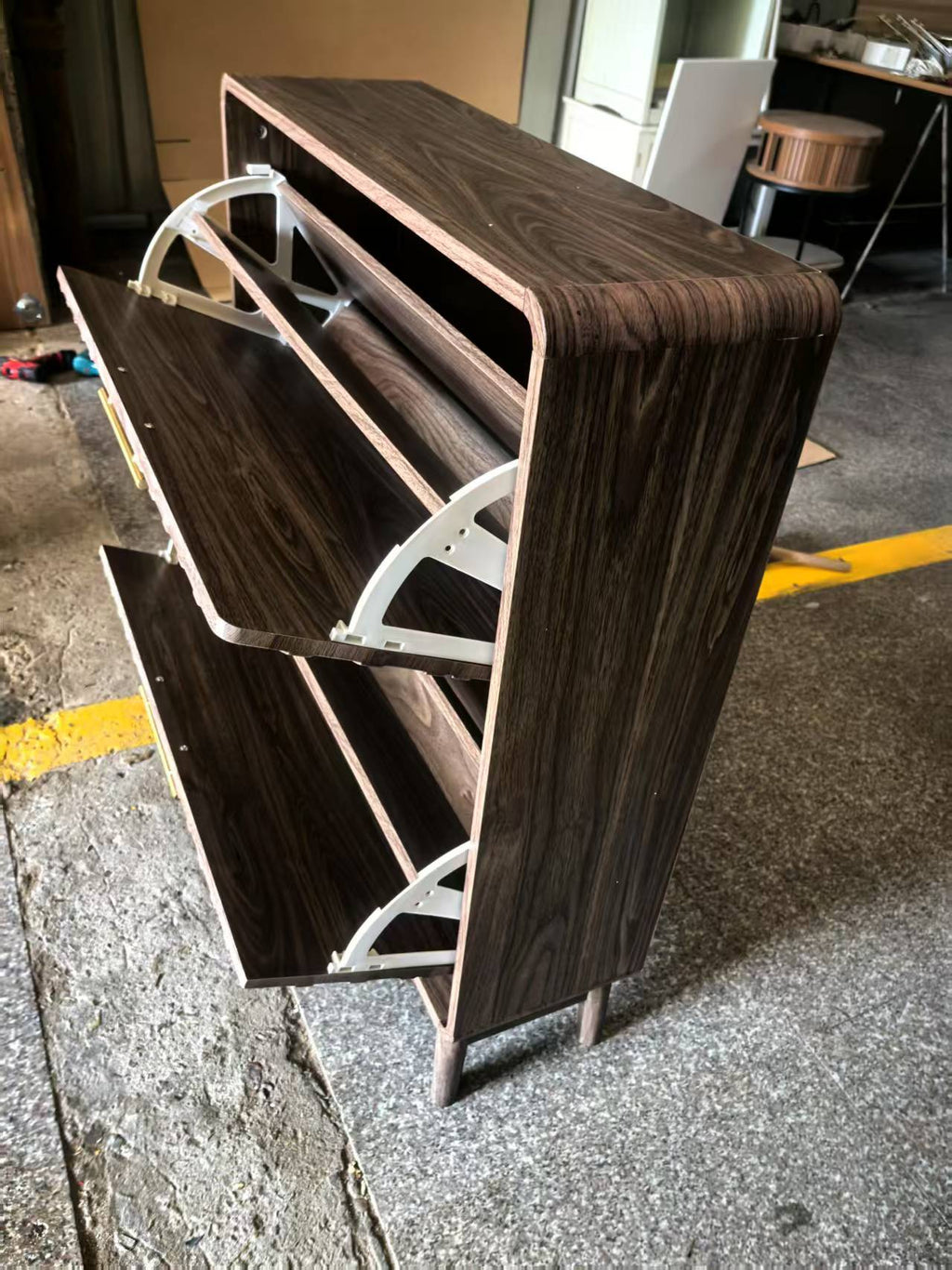 Walnut mid-century studio shoe cabinet with two flip-top drawers by Anthony & Home, showcasing sleek design and storage space.