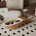 Oval coffee table with storage, solid wood veneer, by Anthony & Home, featuring a sleek design and natural wood finish.