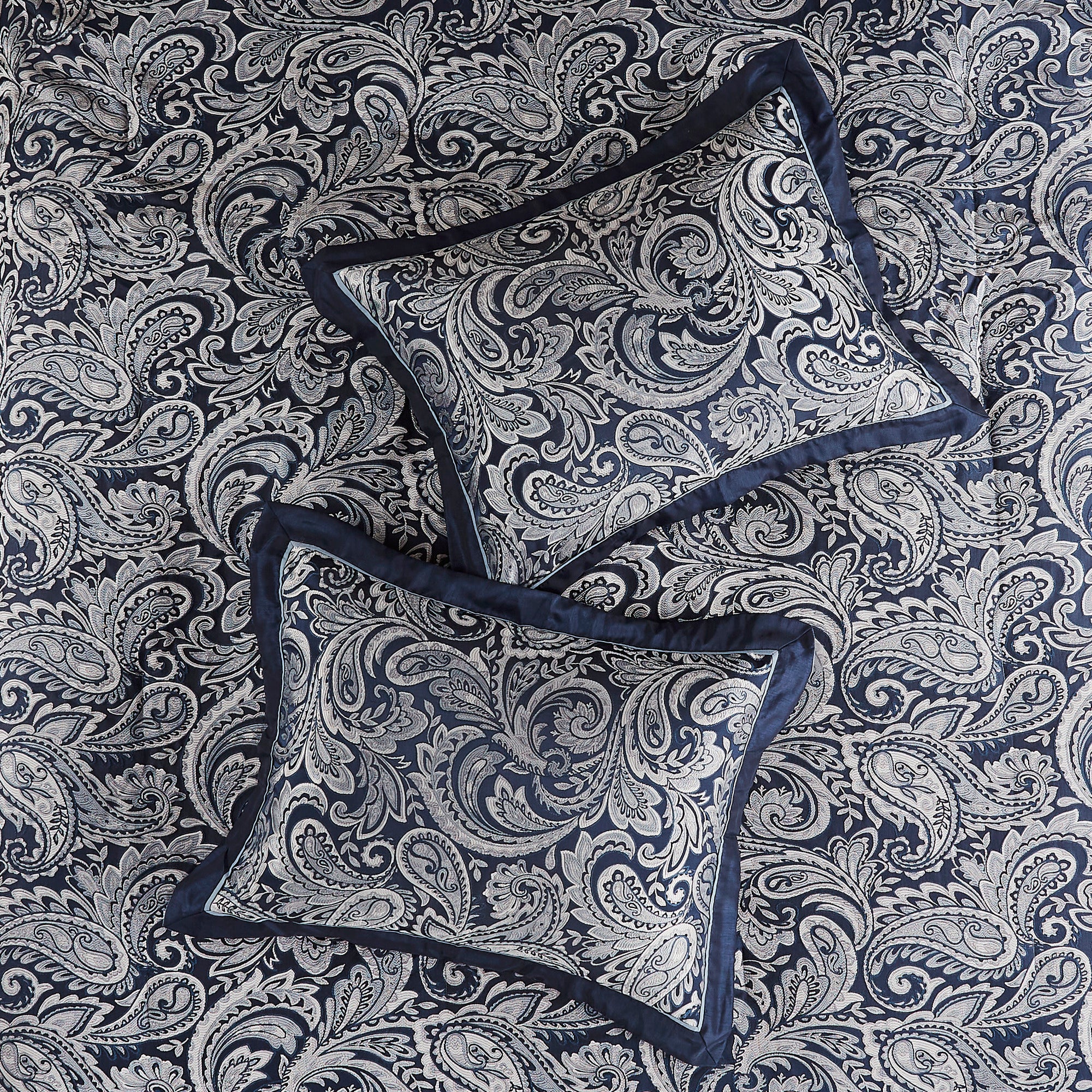 King Aubrey Jacquard navy comforter set by Anthony & Home featuring intricate woven pattern and plush fabric for luxurious bedding.