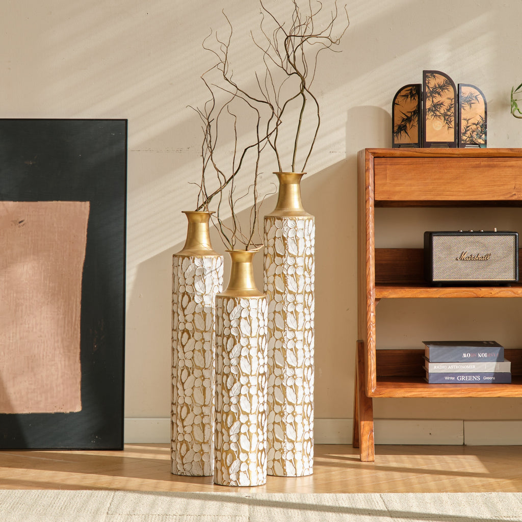 Elegant trio of Heritage Collection floor vases by Anthony & Home, featuring textured ceramic surfaces and classic shapes.