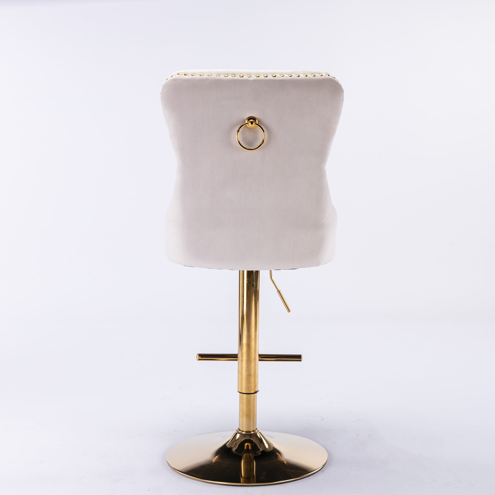 Beige velvet Anthony & Home bar stool with tufted cushion and copper nailhead trim, limited edition, modern kitchen seating.