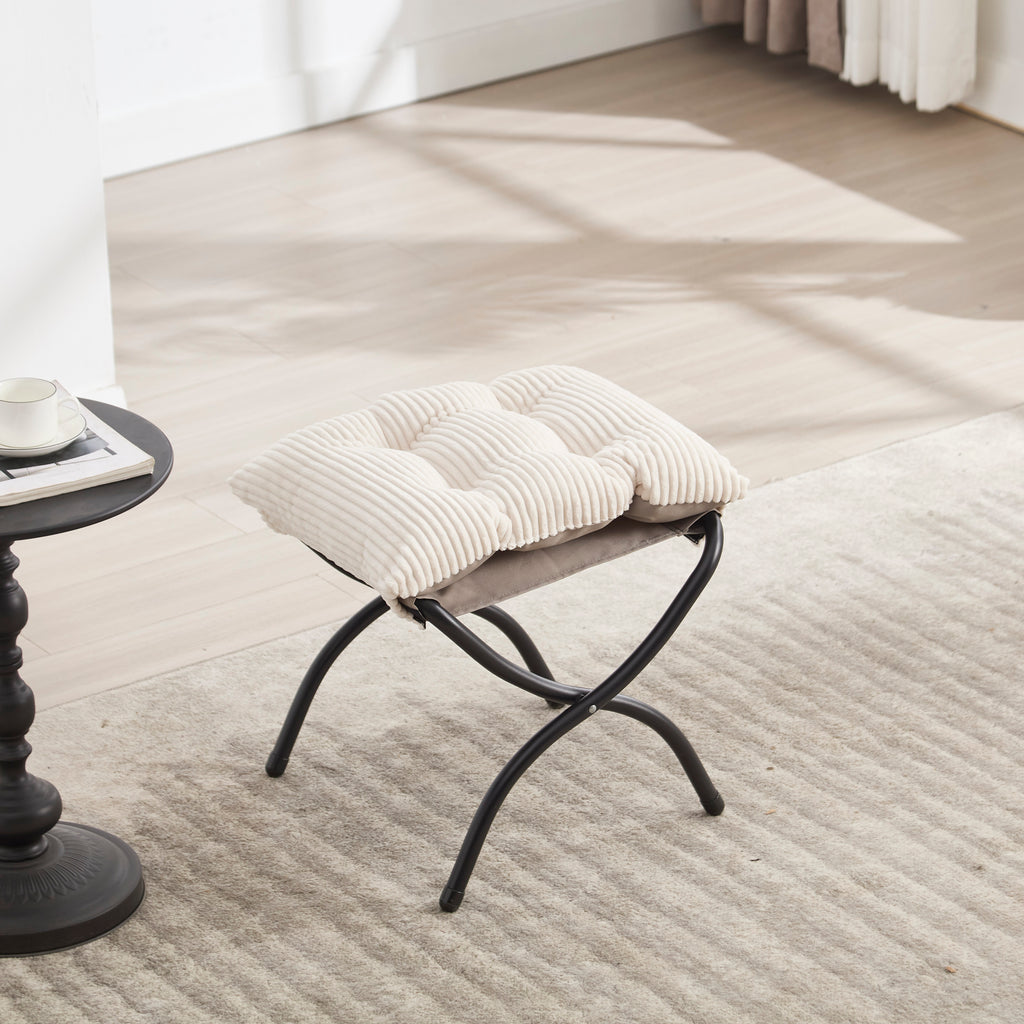 Ivory upholstered lounge chair with matching ottoman and side pocket, modern reading nook accent by Anthony & Home.