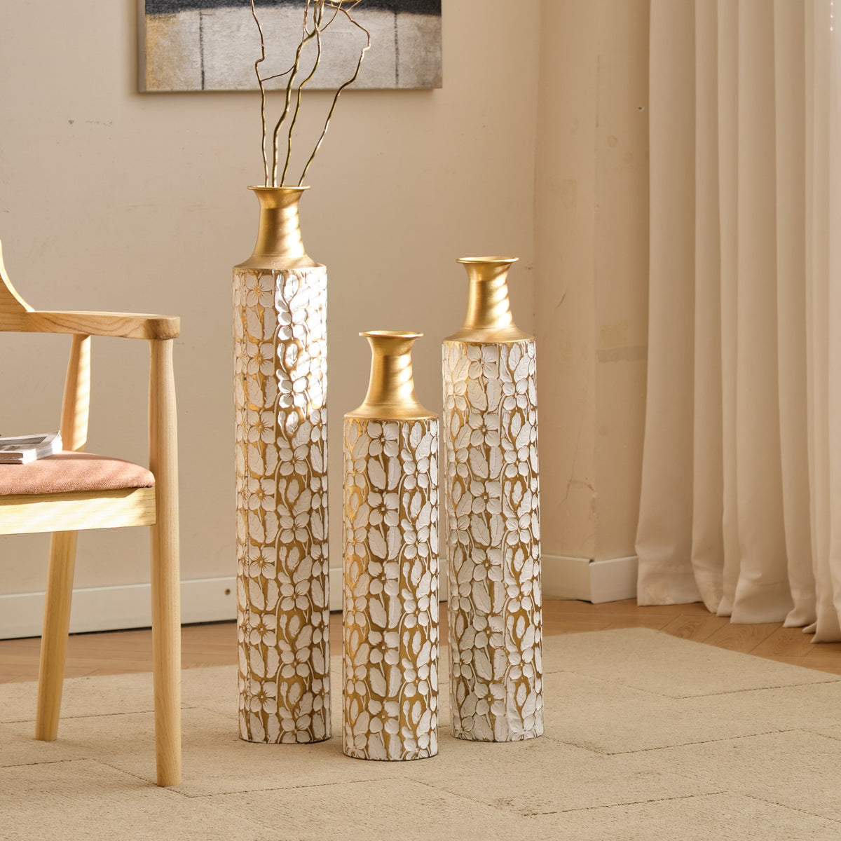 Elegant Heritage Collection floor vase trio by Anthony & Home, featuring three tall ceramic vases with intricate patterns.