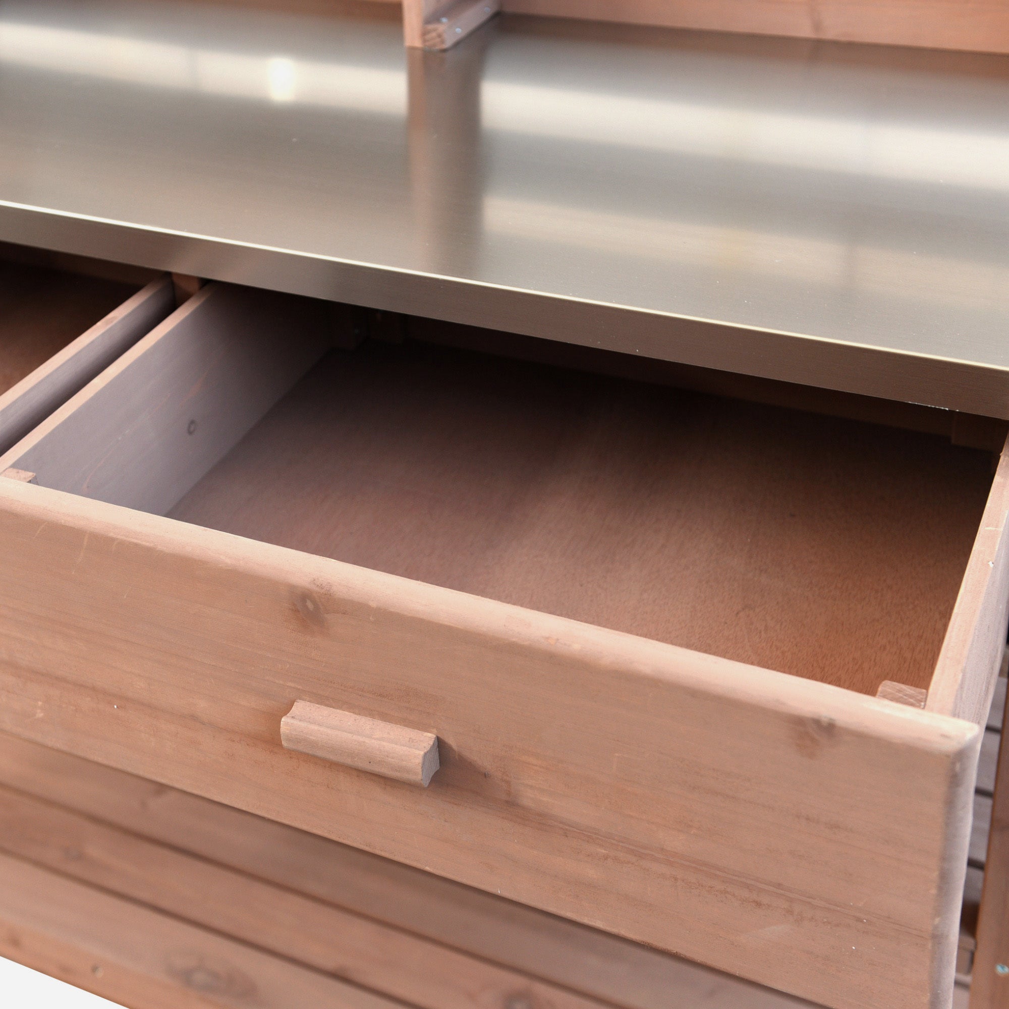 Anthony & Home Signature outdoor potting bench with stainless steel top, featuring a sturdy wooden frame and gardening workspace
