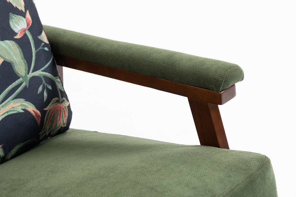 Mid-century modern walnut frame studio rocking chair with plush cushions, designed by Anthony & Home for stylish comfort.