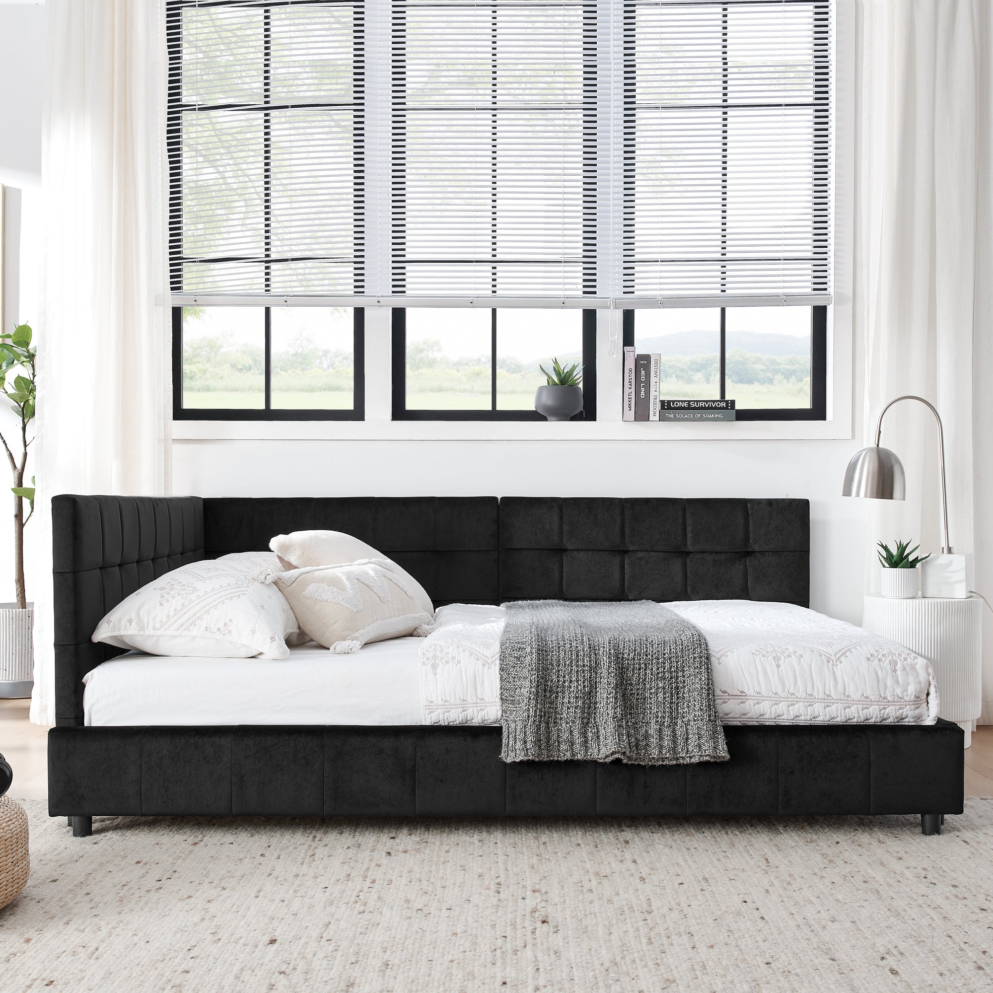 Black Atelier velvet tufted full-size bed frame by Anthony & Home with padded headboard and elegant tufted design.