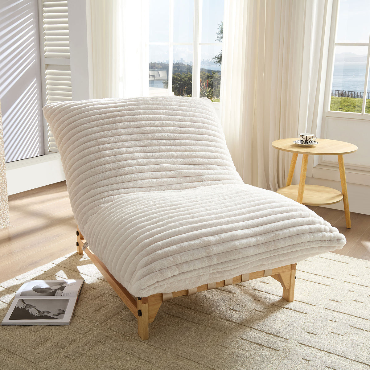 Off-white corduroy armless sofa by Anthony & Home, showing plush fabric and sleek modern design in a stylish living room setting.