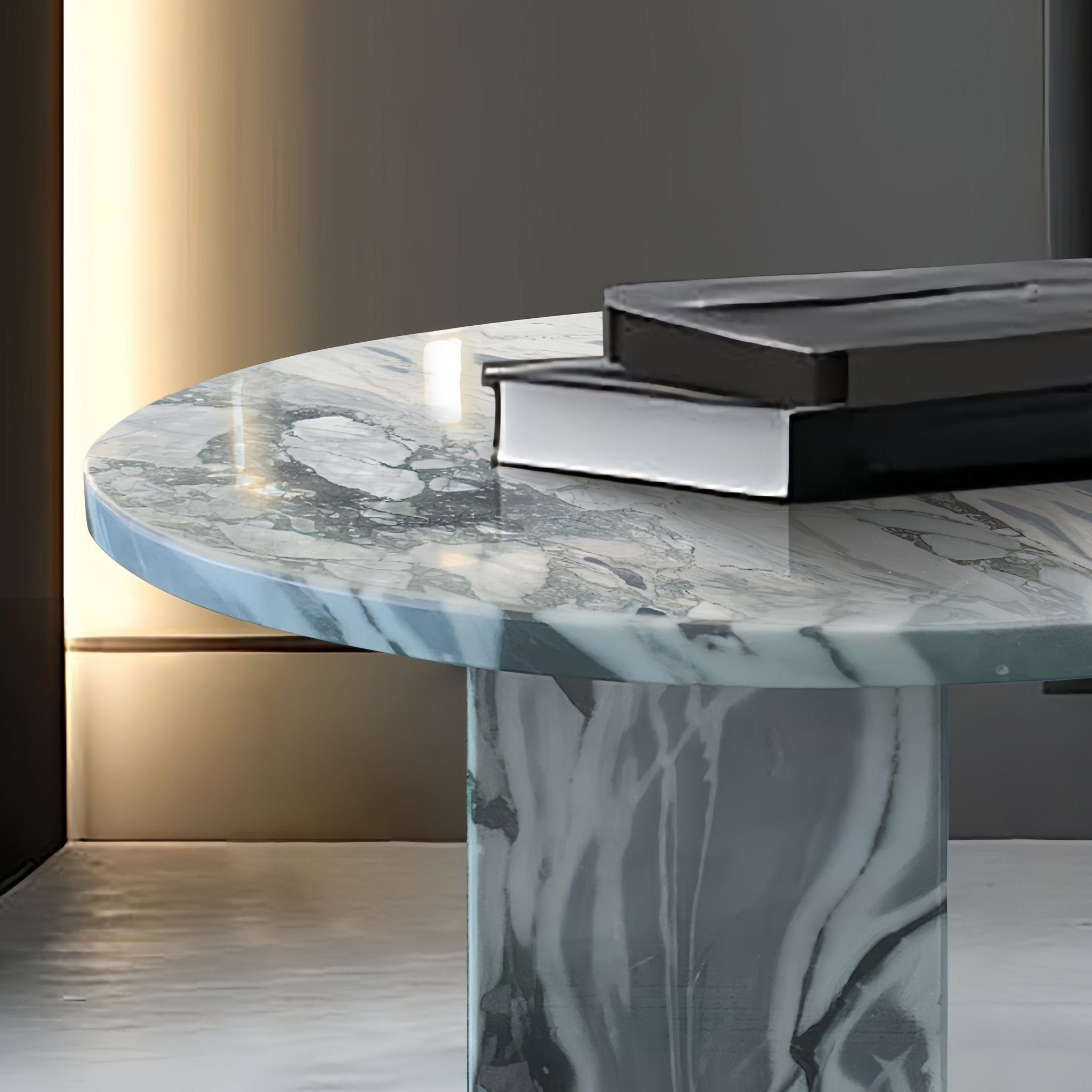 Blue grey marble round coffee table by Anthony & Home, featuring a sleek marble surface and modern design.