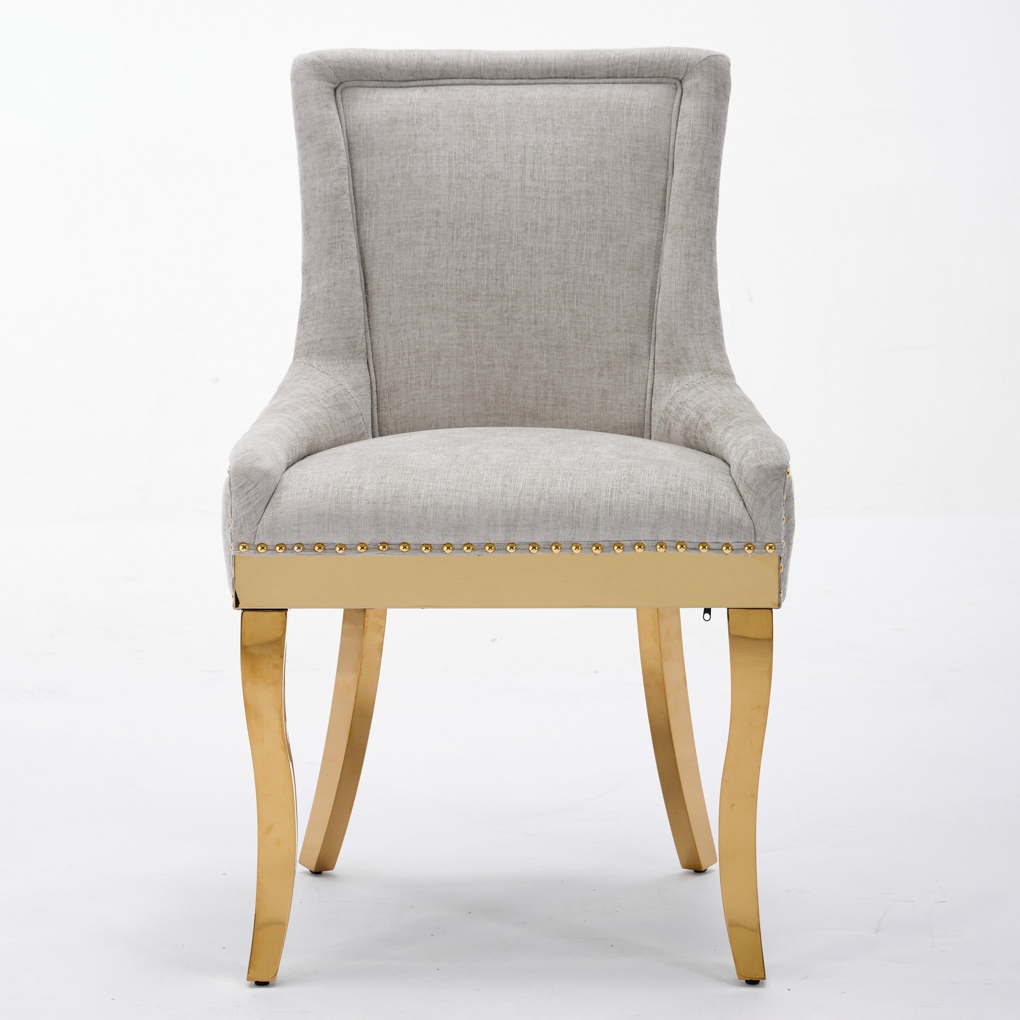 Beige chenille dining chairs with gold plated legs, showcasing a stylish and modern design from Anthony & Home.