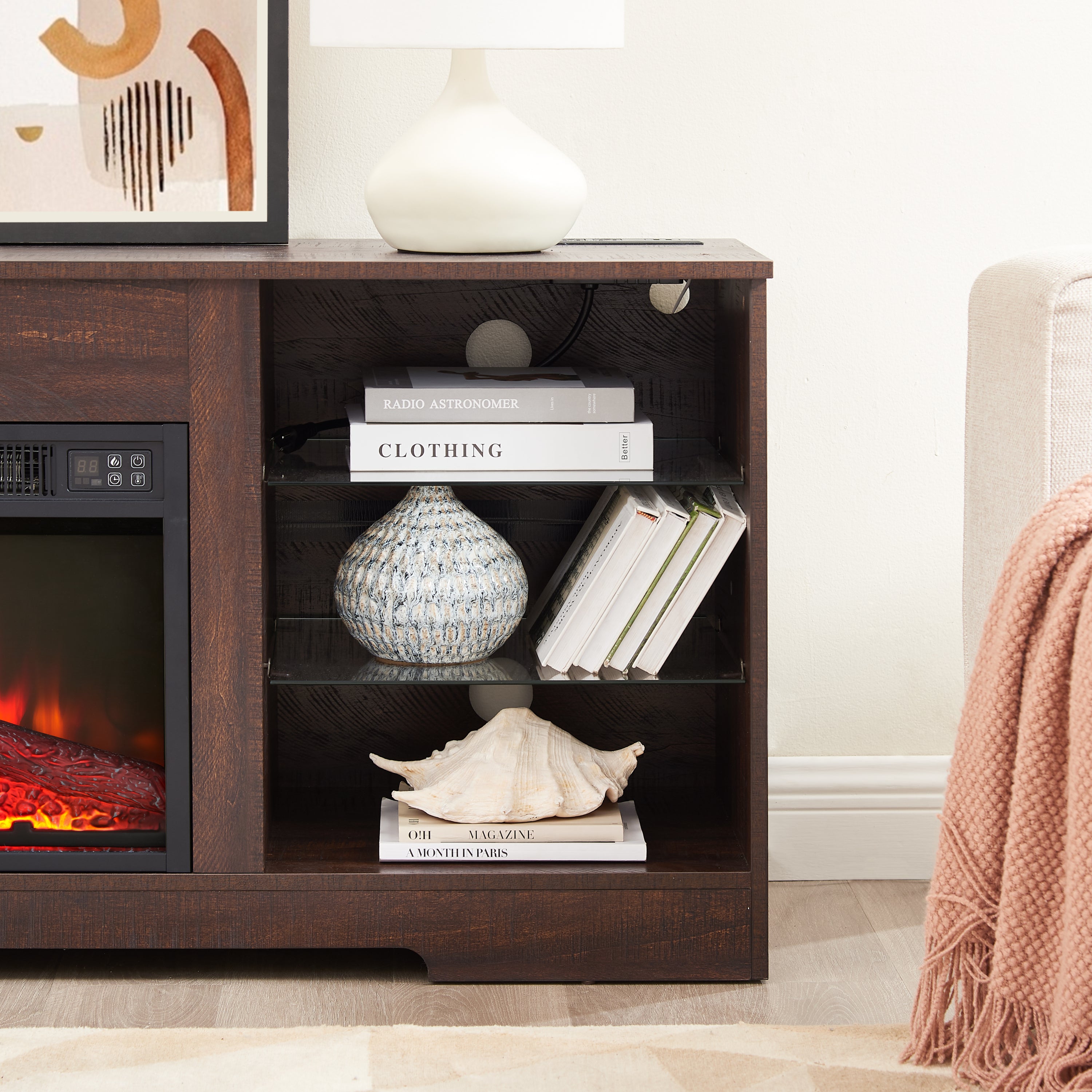 Anthony & Home electric fireplace TV stand with glass shelves, LED lighting, USB outlet, in the Studio Collection.
