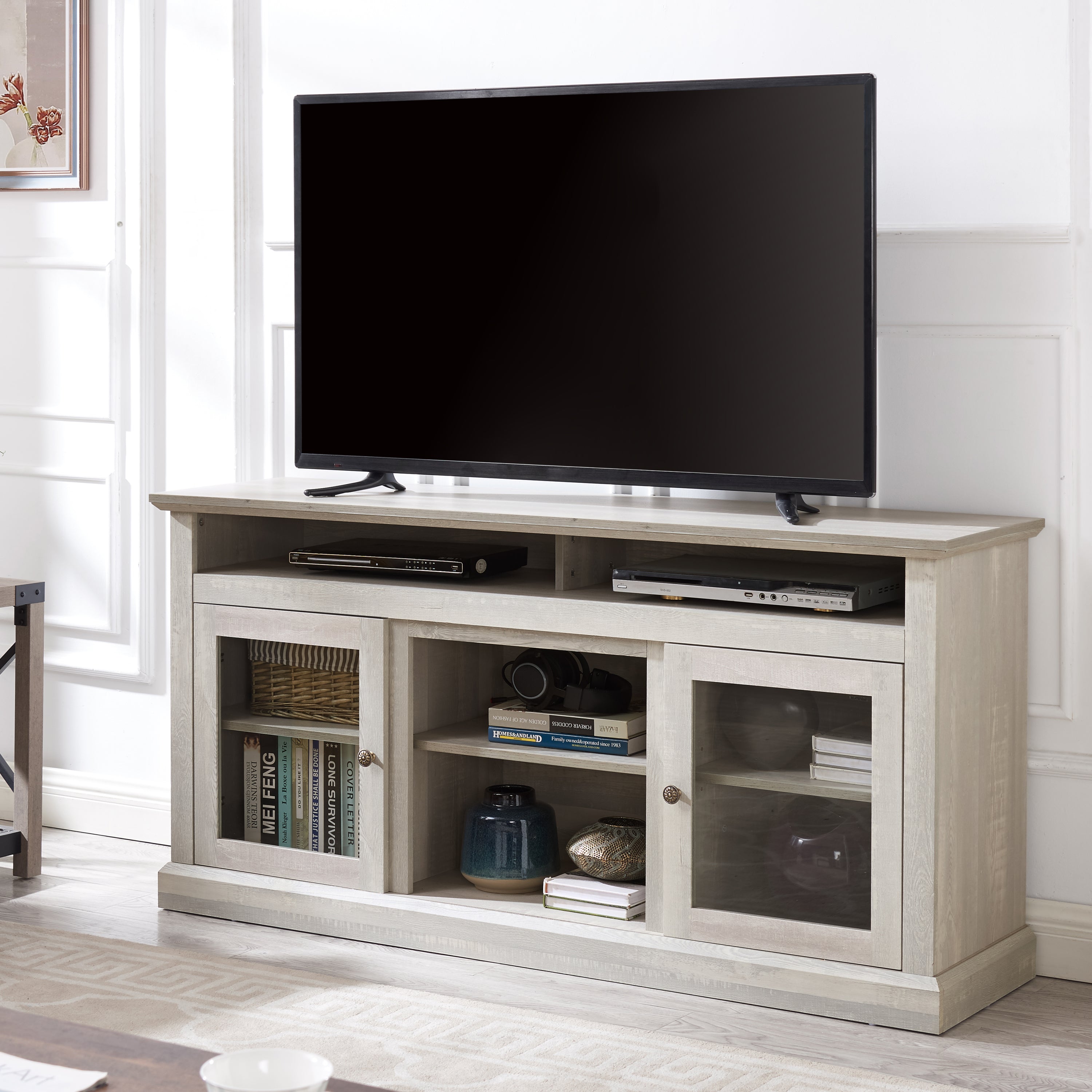 Anthony & Home Atelier Stone Gray television console with dual storage, featuring sleek modern design and ample space for media devices.