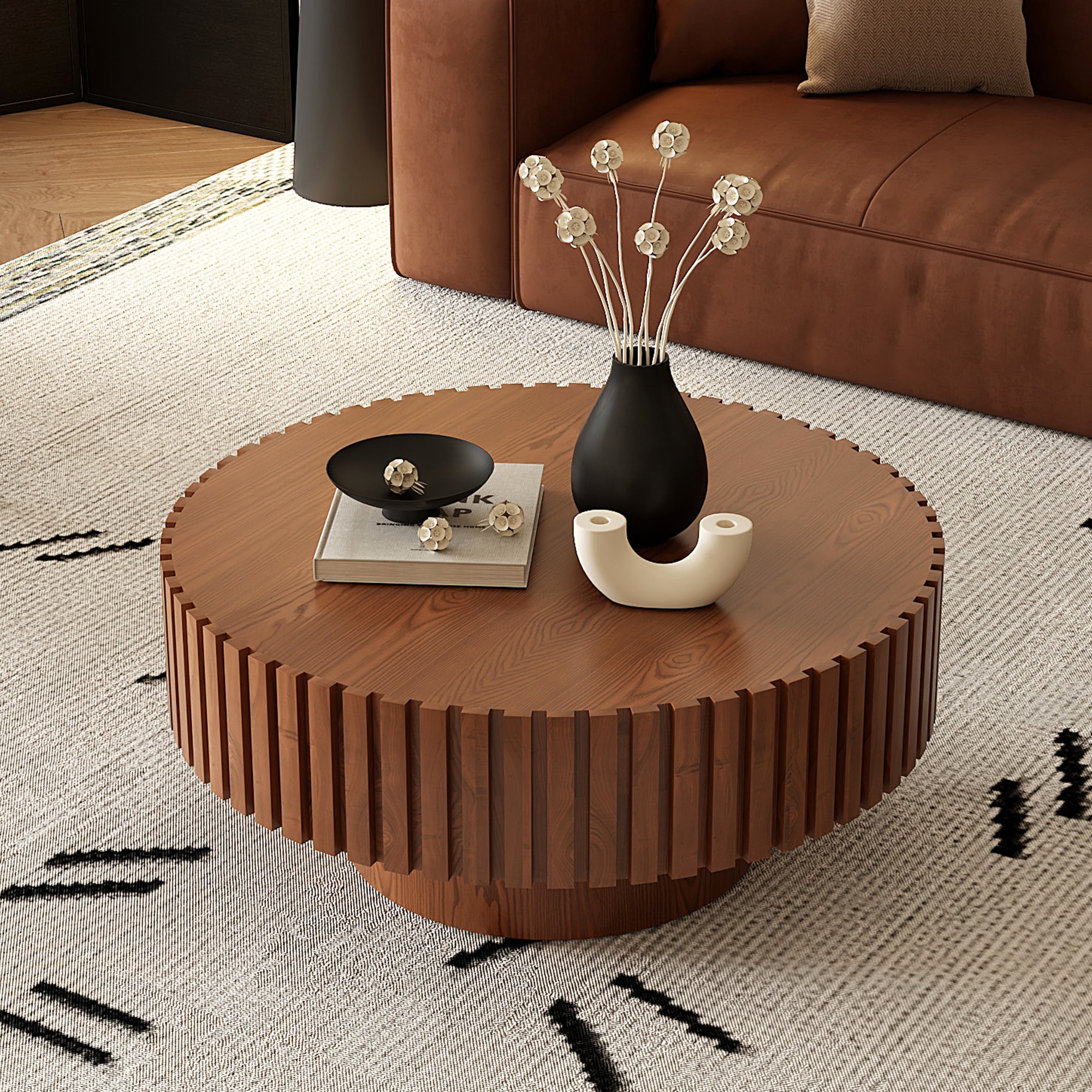 Round lacquered wood coffee table with pedestal base, sleek design by Anthony & Home for contemporary living spaces.