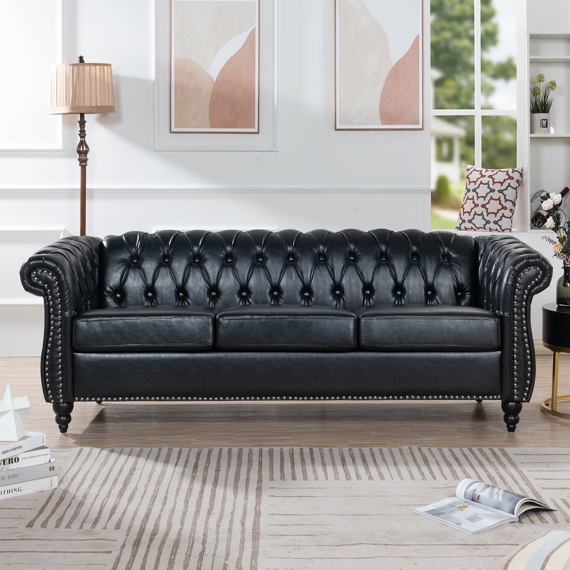 Anthony & Home Chesterfield rolled-arm sofa three-seater with tufted upholstery and wooden legs in a cozy living room setting.