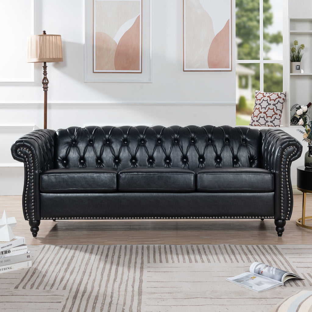 Anthony & Home Chesterfield rolled-arm sofa three-seater with tufted upholstery and wooden legs in a cozy living room setting.