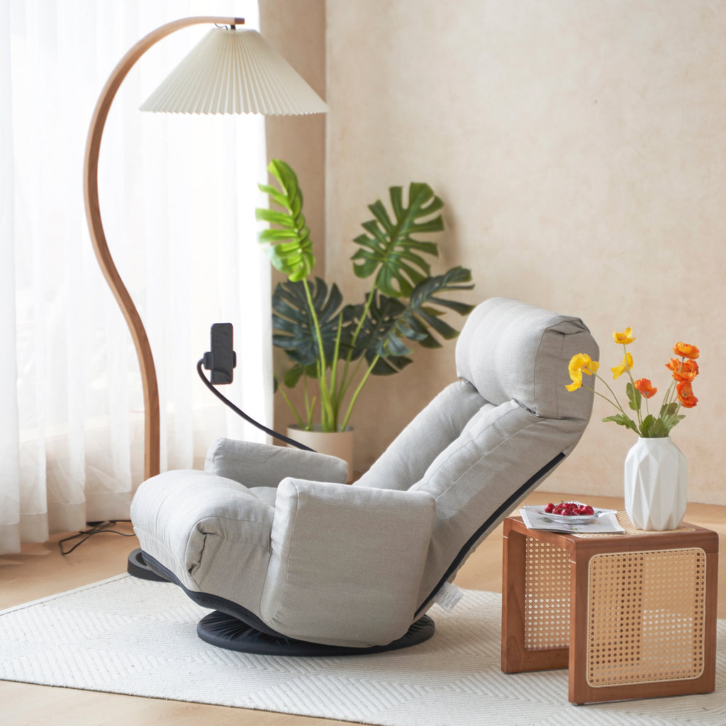 Gray Anthony & Home swivel lounge chair with 360-degree rotation, featuring a modern design and cushioned seat.