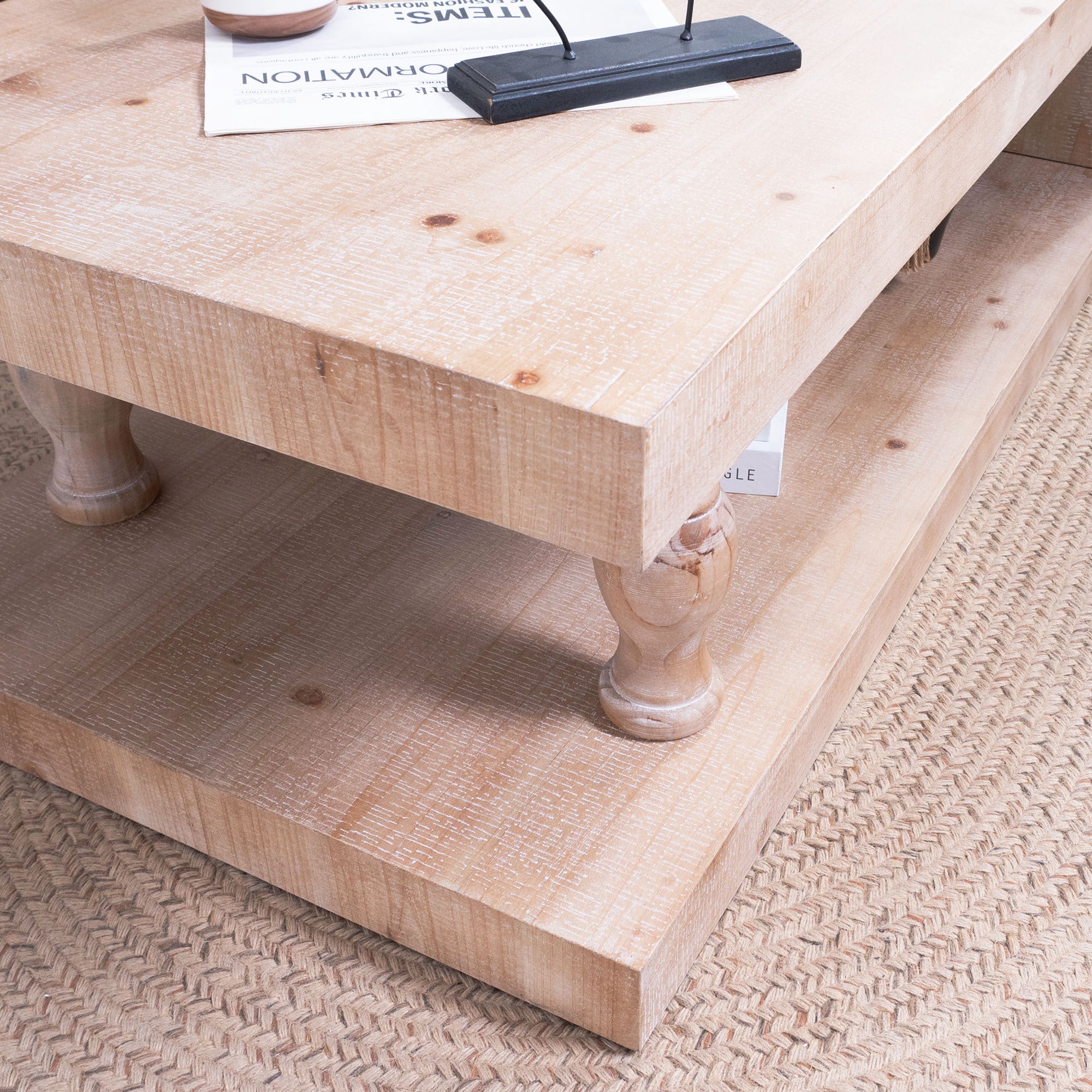 Solid wood coffee table with open shelf in light natural finish from Anthony & Home's modern farmhouse collection.