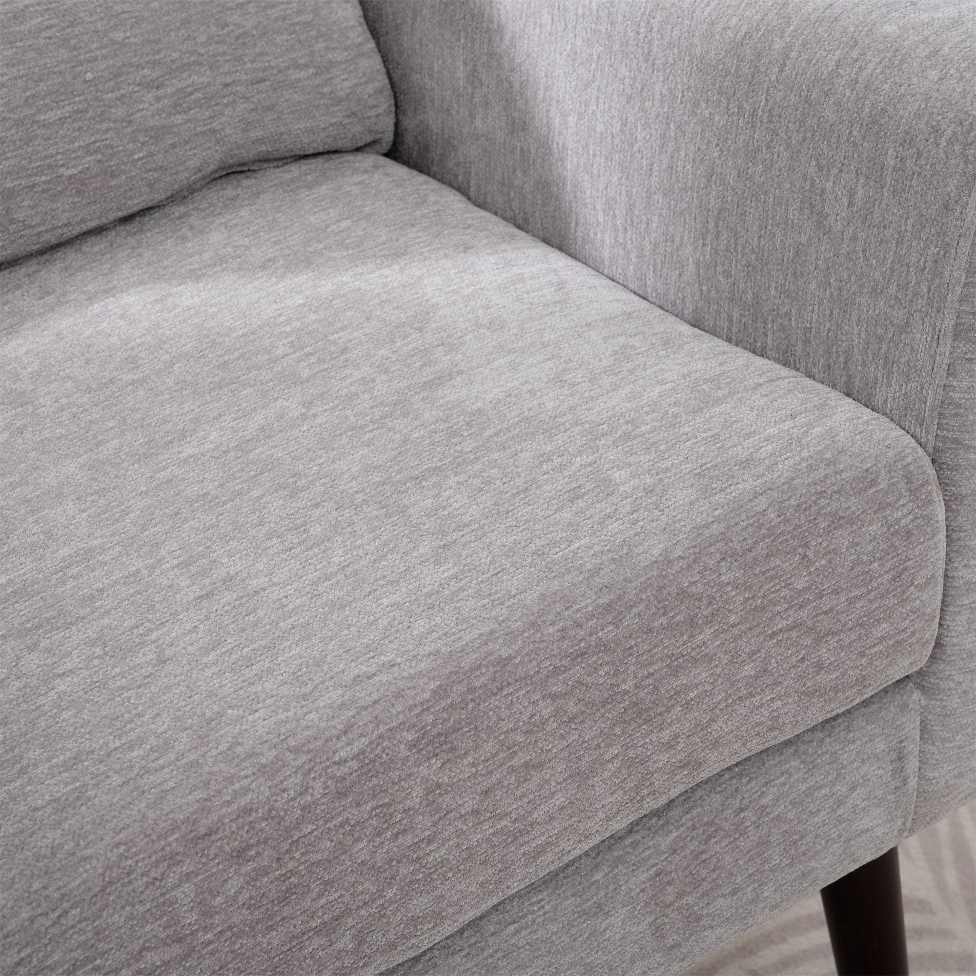 Gray chenille accent chair with solid wood legs, modern studio design by Anthony & Home.