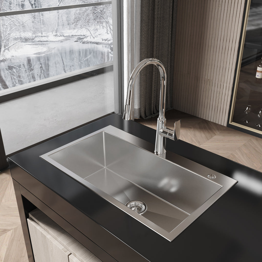 Anthony & Home Studio brushed nickel overmount kitchen sink with deep basin and sleek modern design.