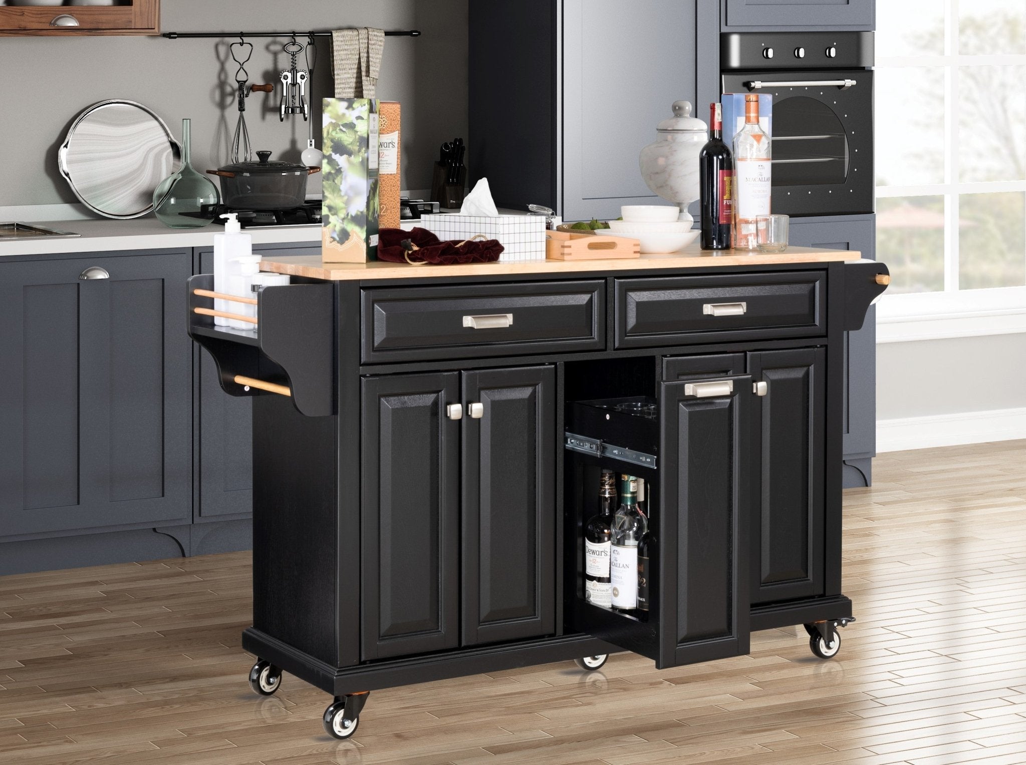 Black rubberwood kitchen island by Anthony & Home featuring a spacious surface and storage drawers in a modern design.