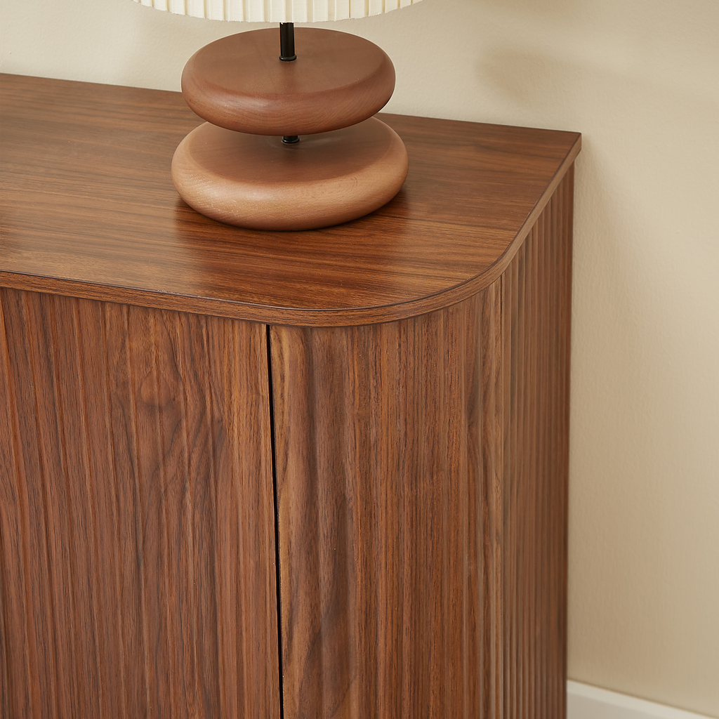 Walnut 58-inch modern wavy curve sideboard by Anthony & Home, showcasing sleek design and smooth curved wooden surface.
