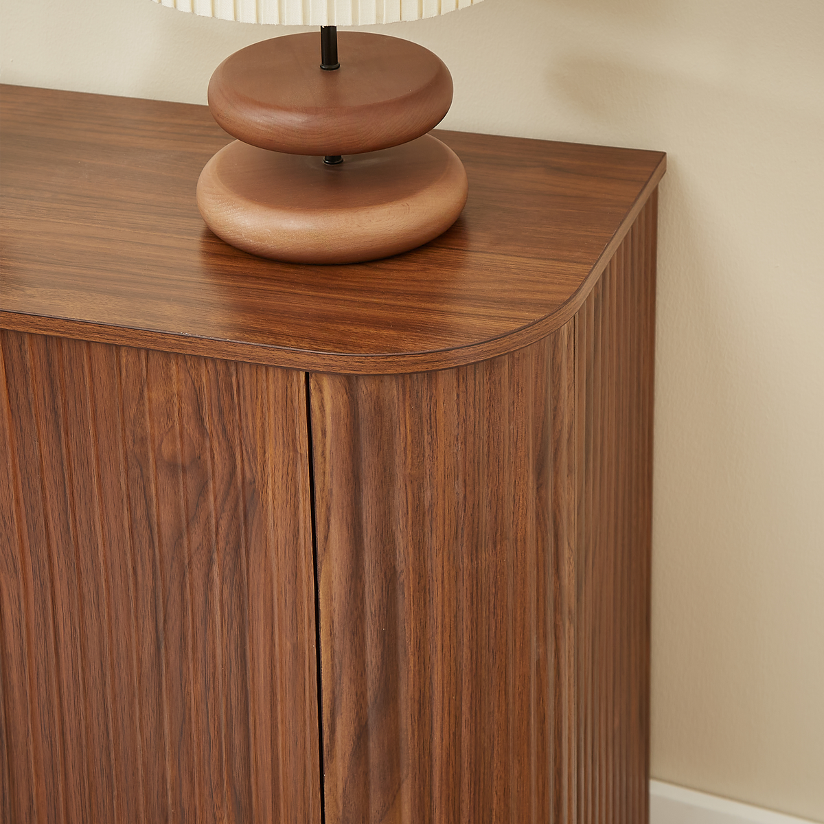 Walnut 58-inch modern wavy curve sideboard by Anthony & Home, showcasing sleek design and smooth curved wooden surface.