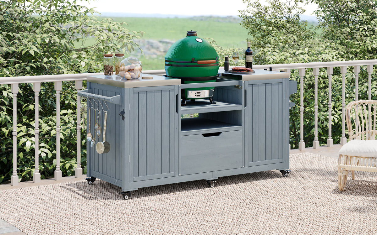 Solid wood outdoor kitchen island for Big Green Egg, Anthony & Home, with countertop and storage space for outdoor cooking.
