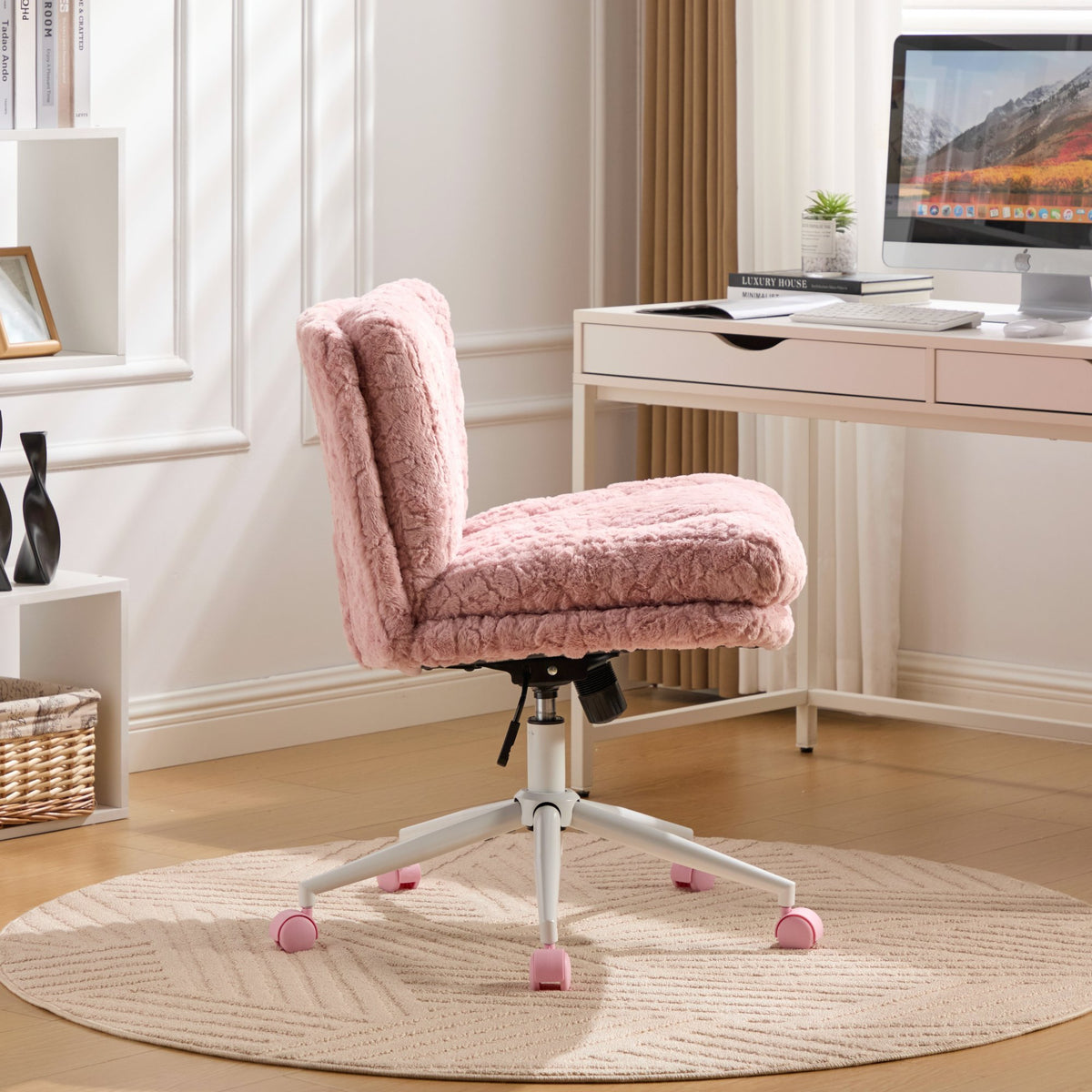 Studio pink faux rabbit hair office chair with metal base and 26.4-inch wide seat by Anthony & Home.