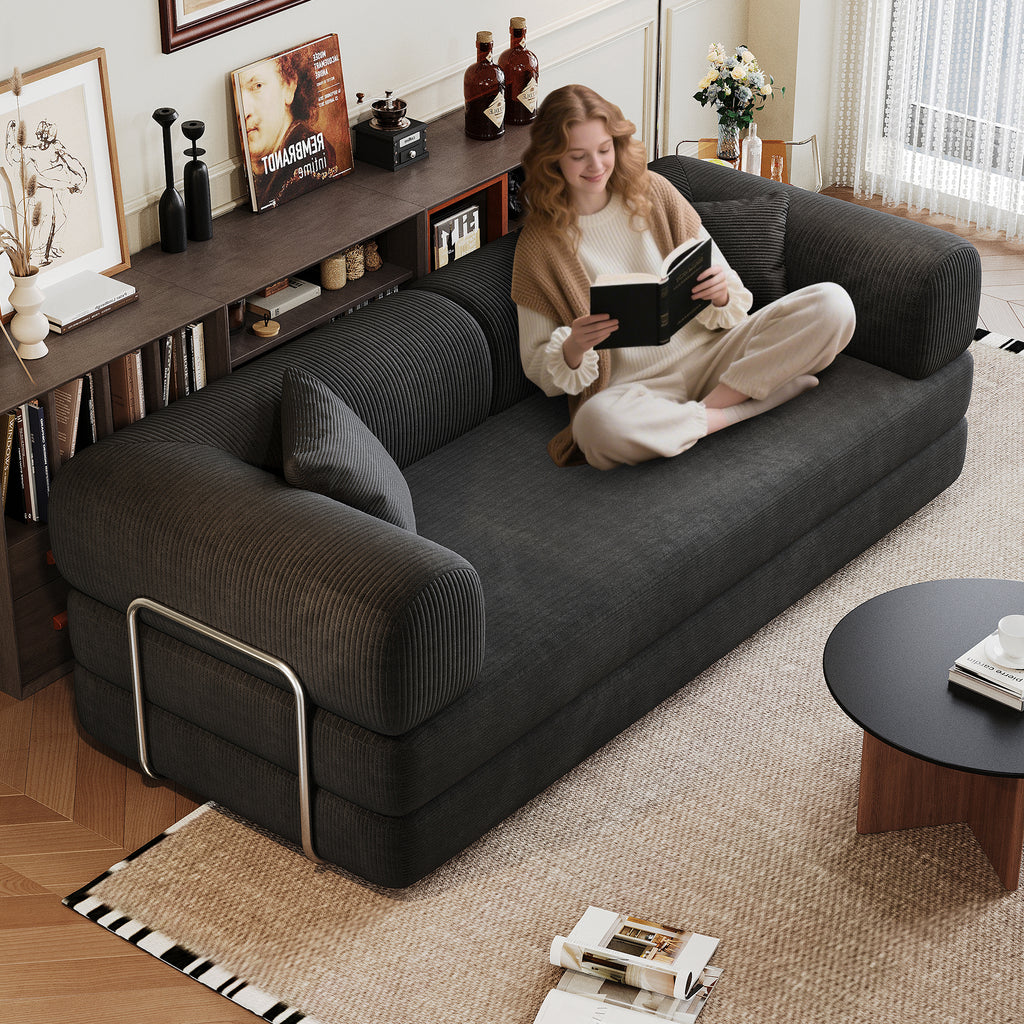 Black corduroy convertible sofa bed from Anthony & Home's Atelier Collection, showcasing its sleek design and versatile functionality.